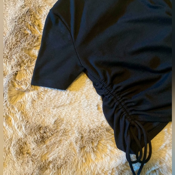 Black ruffled side shirt with adjustable strings brand labeled ZARA. - Picture 2 of 2